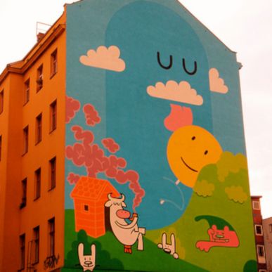 An apartment building with a cartoon mural
